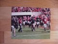 Picture: Kirby Smart leads the Georgia Bulldogs original and high quality 20 X 30 poster.