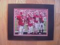 Picture: The 2008 Georgia Bulldogs Captains original 8 X 10 photo professionally double matted to 11 X 14 so that it fits a standard frame features Matthew Stafford, Brian Mimbs, and Tripp Chandler.