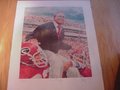 Picture: Vince Dooley hand-signed 1988 Georgia Bulldogs limited edition 24 X 30 print of his last ever regular season game as the Georgia Bulldogs Head Football Coach, which was also his last Sanford Stadium game. This print is also signed and numbered by artist Wayland Moore. The image area is approximately 18 1/2 X 23. One of the hardest prints ever to collect-only 300 issued in this size-the largest one-signed and numbered by the artist as well. The autograph comes with a Certificate of Authenticity. An iconic image of Dooley being carried off the field at Sanford Stadium for the last time as head coach of the Georgia Bulldogs after a 24-3 win over Georgia Tech on November 26, 1988 in front of 82,011 fans. Were you there almost 30 years ago?