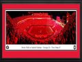 Picture: This panorama captures the excitement at Sanford Stadium during the debut of the new LED lighting system to start the 4th quarter against Notre Dame in their 23-17 win on September 21, 2019. At the start of the fourth quarter, the Georgia Redcoat Band begins playing Krypton. Fans wave their arms and light up their cell phones to celebrate their love of Georgia football. In addition to a new video scoreboard and LED signage, Sanford Stadium's red lights have brought a new tradition to Dawgs football. This is the first ever officially licensed stadium print of Vince Dooley Field at Sanford Stadium. This is a 13.5 X 40 panorama of the Georgia Bulldogs 23-17 win against Notre Dame on September 21, 2019 that is professionally double matted in Bulldogs team colors and framed to 18 X 44 and ready to hang on your wall. This shows the Georgia football team during their much-anticipated matchup with the Notre Dame Fighting Irish on Dooley Field at Sanford Stadium. Named for the late Dr. Steadman V. Sanford, a former University president, the stadium was built in 1929 for $360,000. As of 2019, it is the eighth largest on-campus stadium in the nation with a capacity of 92,746. It has long been one of the country's most magnificent and exhilarating venues for college football, nationally ranking among the top ten in attendance. A favorite Georgia victory tradition is the "ringing of the chapel bell." The university, founded in 1785 in Athens, GA, educates over 38,200 students. Show your team spirit with a Panorama game-day print. The state-of-the-art cameras capture amazing high definition photos from carefully researched vantage points inside the stadiums and arenas that are so clear and life-like, you'll feel like you were there. These officially licensed, Made in the USA, large panoramic prints proclaim your allegiance to your team while creating a focal point in the home, office or fan cave. They also make the perfect gift for the sports fan in your life.